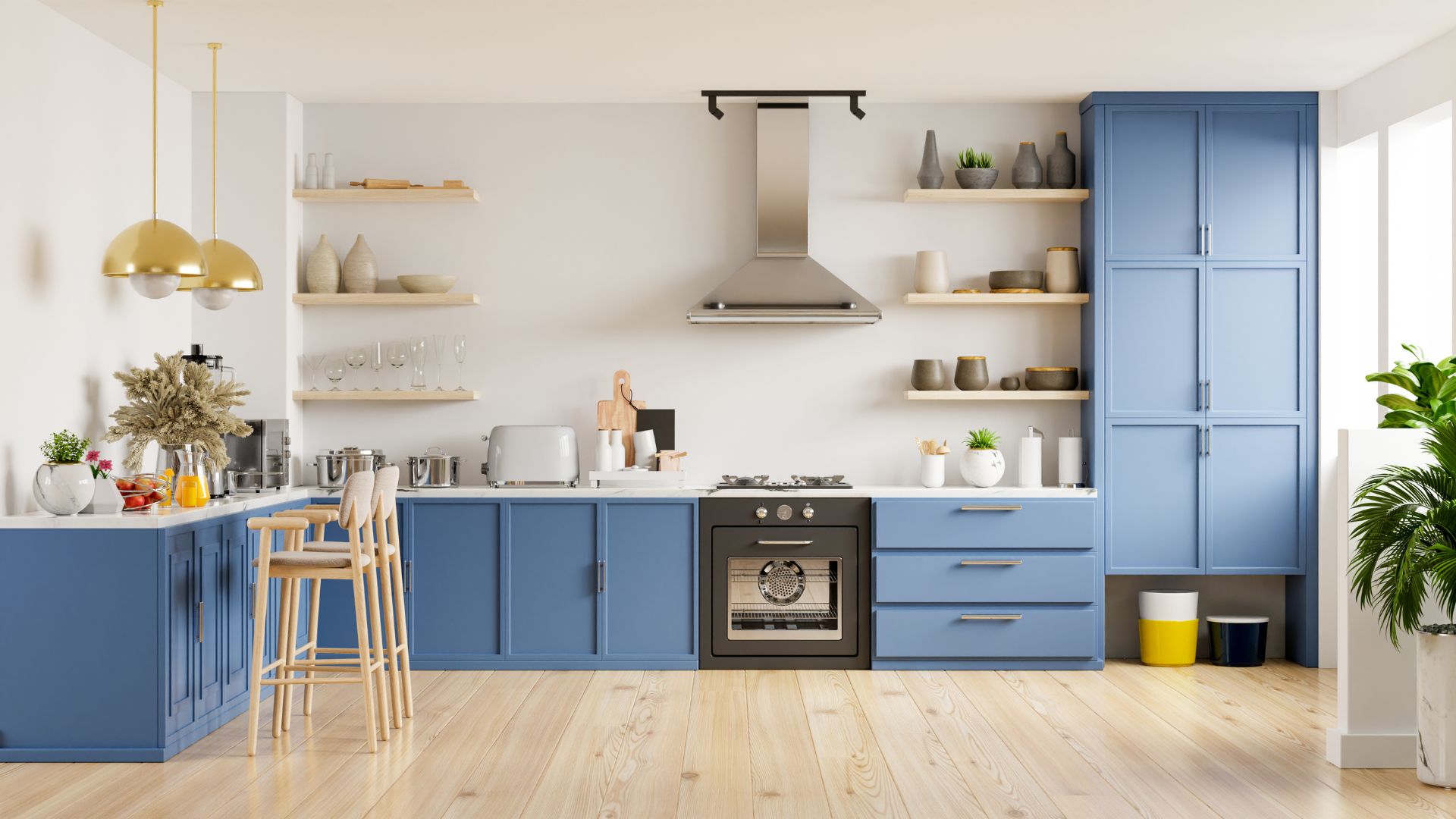 Modern blue kitchen with wooden floors, open shelves, and gold pendant lights